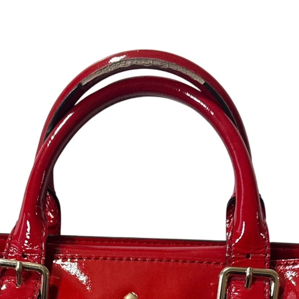 Kate Spade Carlisle Street Sylvie red patent leather satchel with shoulder strap